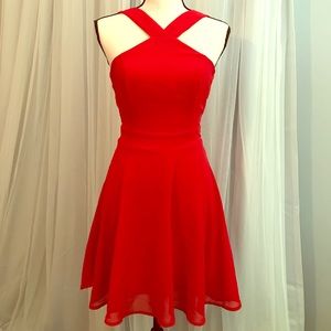 Red high-halter dress with cross-cross design